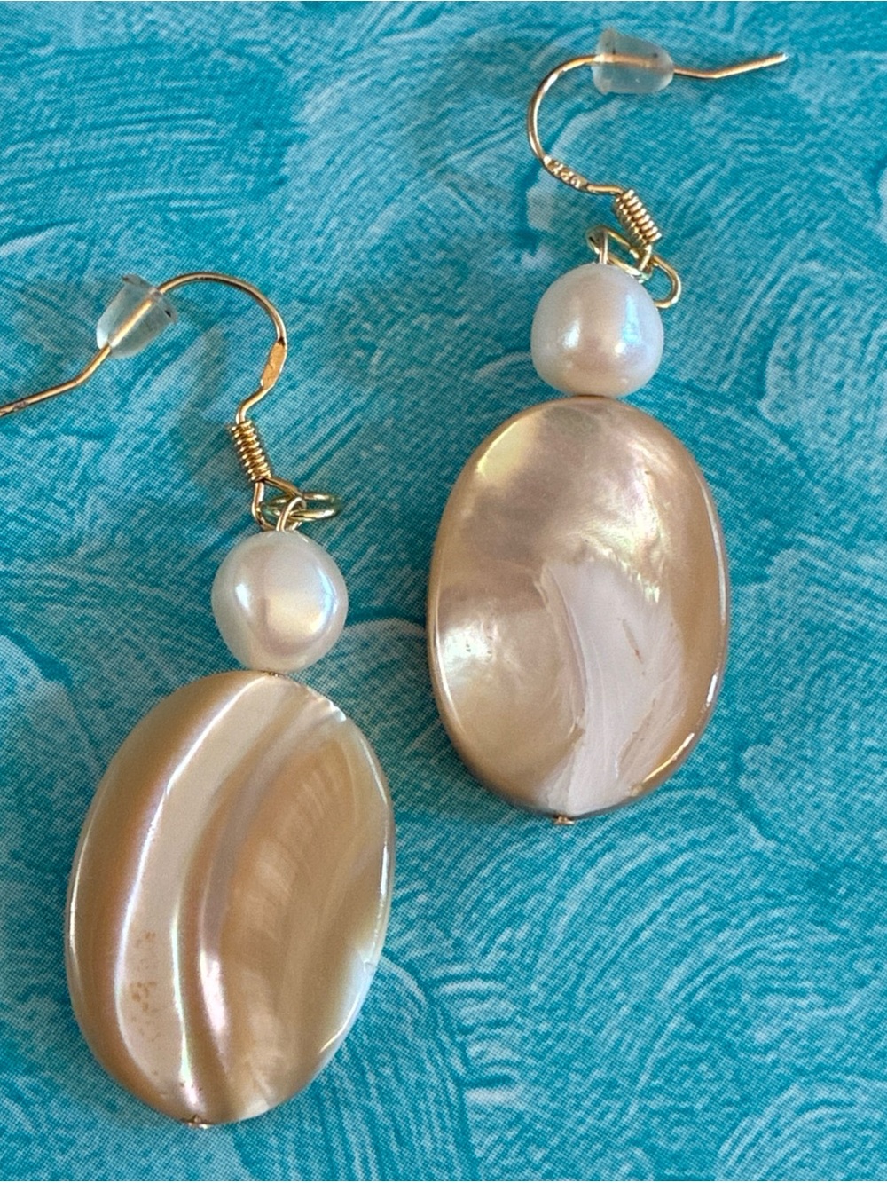 Hand crafted mother of pearl dangle earrings on gold plated wire